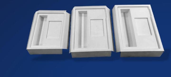 Wet press molded pulp inserts