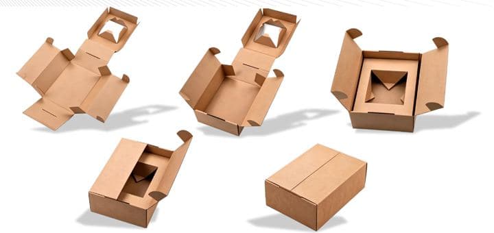 Corrugated boxes with built-in fitments