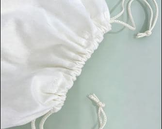 Fiber drawstring bags